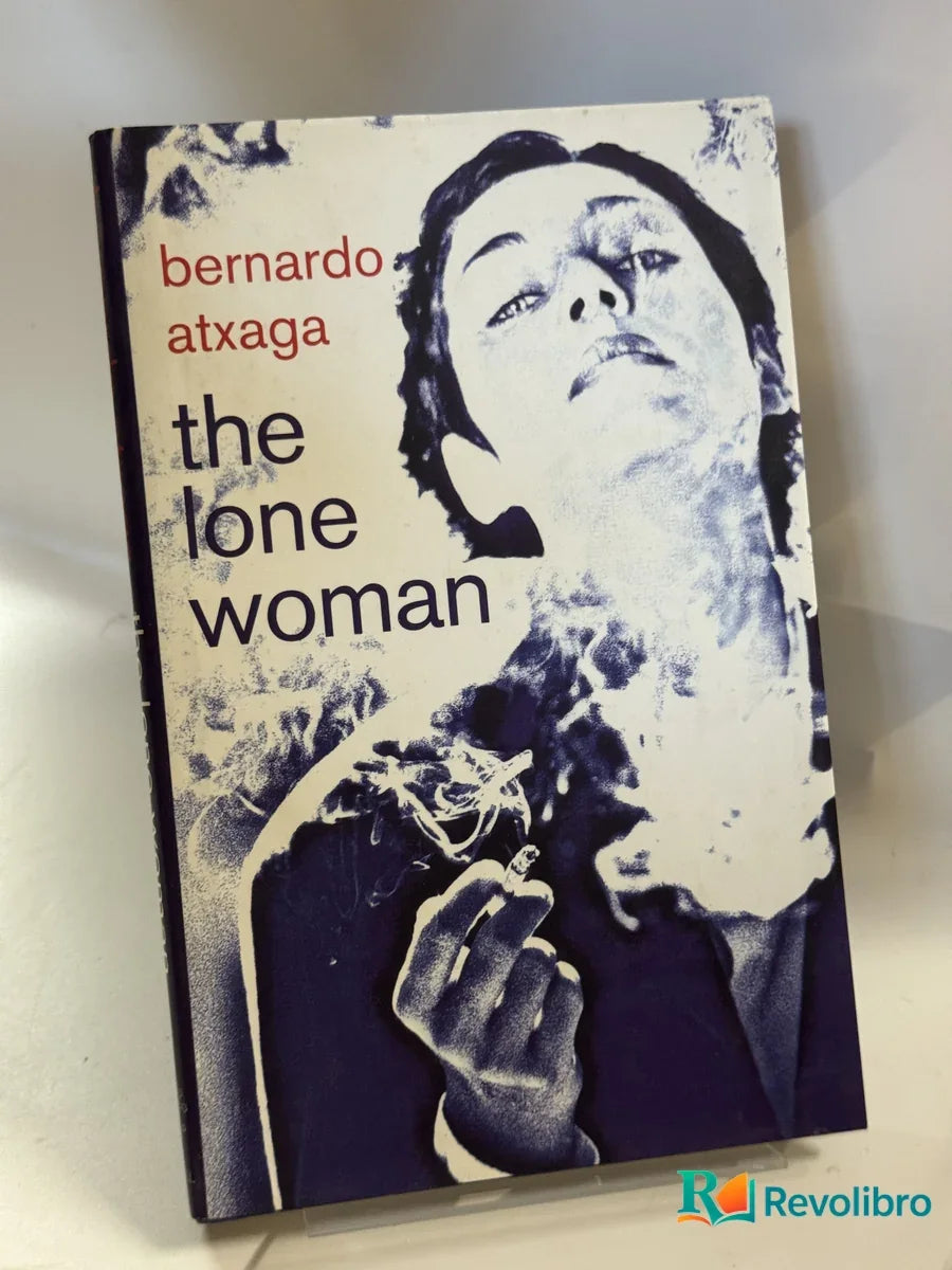 Portada de the lone woman de bernardo atxaga, libro de segunda mano