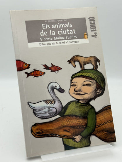 Portada de Els animals de la ciutat de Vicente Muñoz Puelles, libro de segunda mano