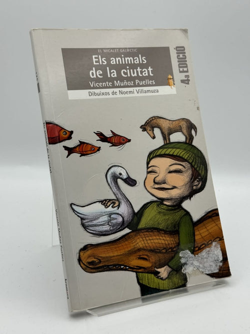 Portada de Els animals de la ciutat de Vicente Muñoz Puelles, libro de segunda mano