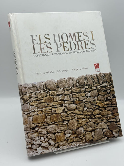 Portada de Els Homes i les pedres - Francesc Miralles, Julio Monfort, Margarita Marín de Francesc Miralles, libro de segunda mano