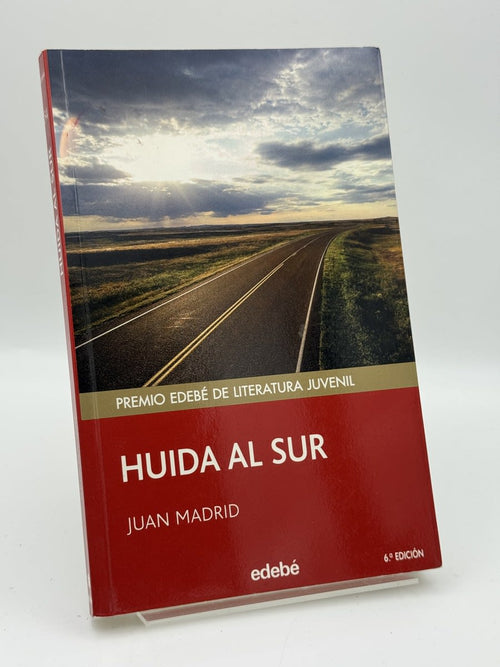 Portada de Huida al Sur de Juan Madrid, libro de segunda mano