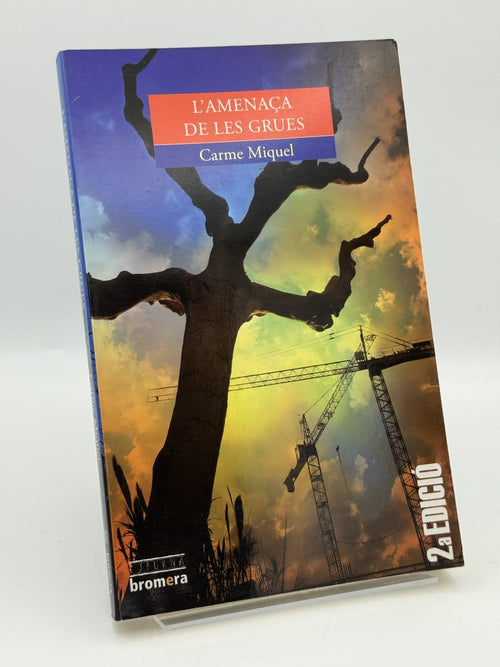 Portada de L'amenaça de les grues de Carme Miquel, libro de segunda mano
