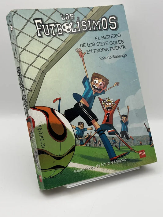 Los fotbolisimos. El misterio de los siete goles en propia puerta de Roberto Santiago | Libro segunda mano - Portada