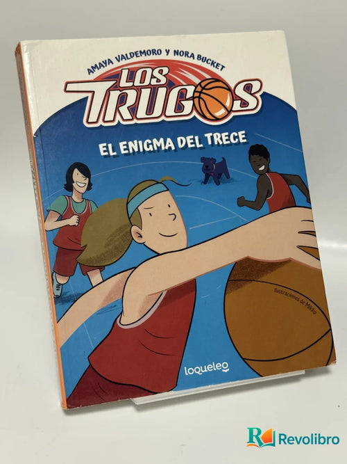 Portada de Los Trugos. El enigma del Trece de Amaya Valdemoro Madariaga, libro de segunda mano