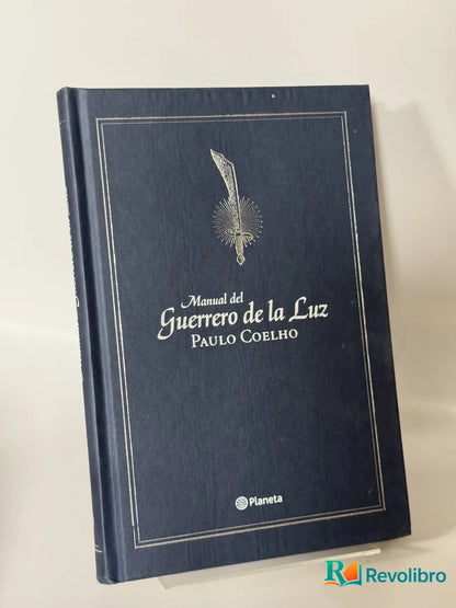 Portada de Manual del Guerrero de la Luz de Paulo Coelho, libro de segunda mano