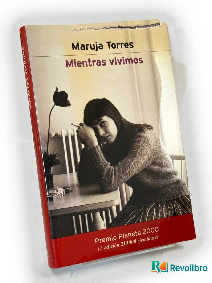 Portada de Mientras vivimos - 1ª edición de Maruja Torres, libro de segunda mano