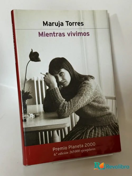Portada de Mientras vivimos de Maruja Torres, libro de segunda mano