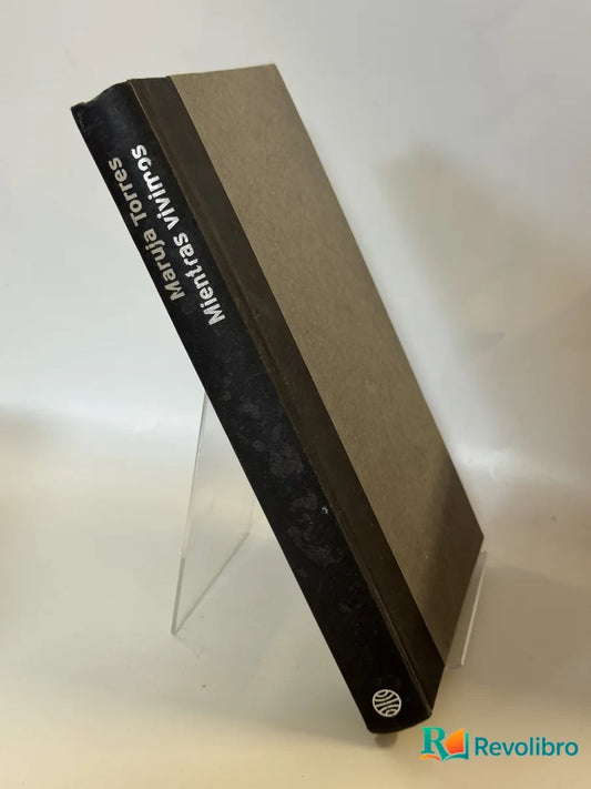Portada de Mientras vivimos de Maruja Torres, libro de segunda mano