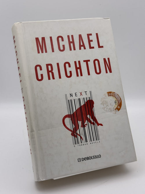 Portada de Next de Michael Crichton, libro de segunda mano