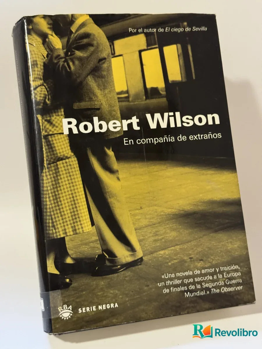 Portada de En compañía de extraños de Robert Wilson, libro de segunda mano