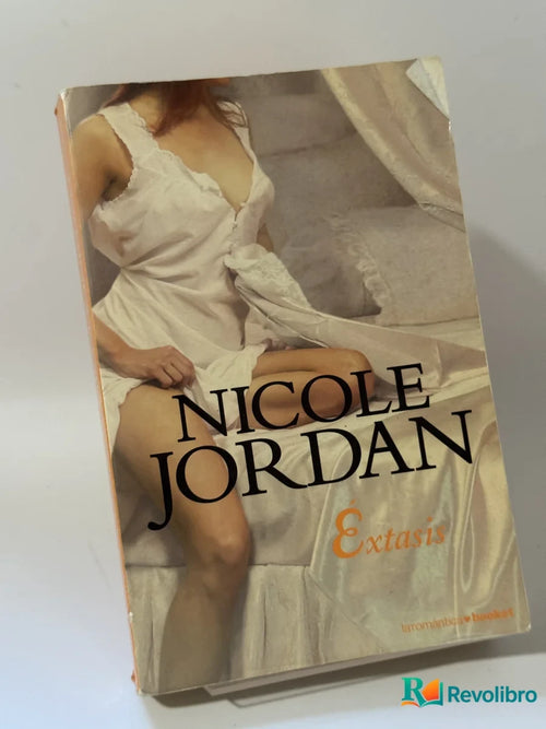 Portada de Extasis de Nicole Jordan, libro de segunda mano