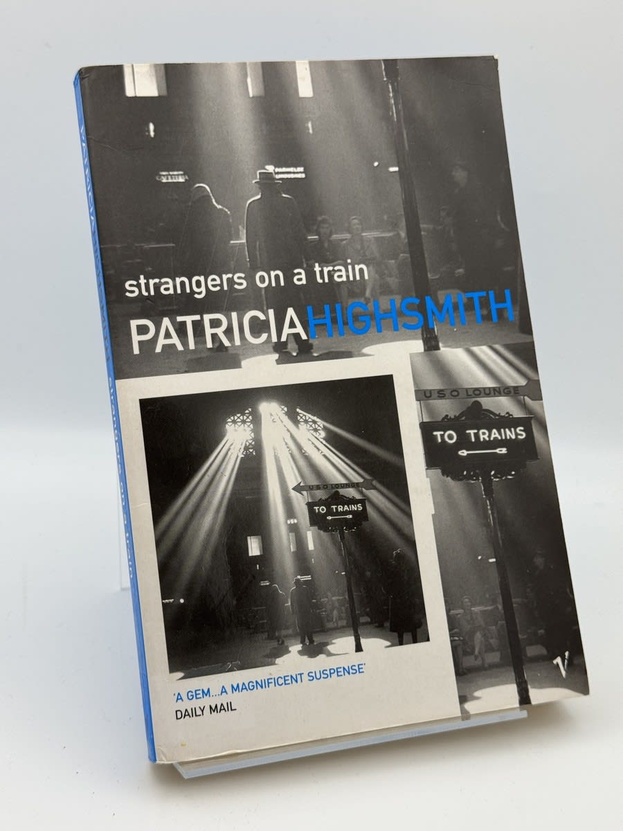 Portada de Strangers on a Train de Patricia Highsmith, libro de segunda mano