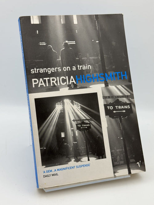 Portada de Strangers on a Train de Patricia Highsmith, libro de segunda mano